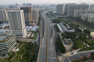 China Locks Down Key Transportation Hub; Markets Fear Economic Fallout