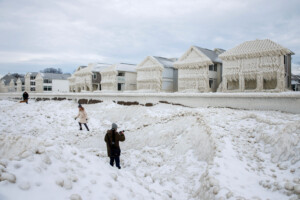 Homes On Lake Erie Were Encased In Ice As Blizzard Whipped Frigid Waves Onshore