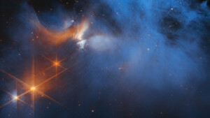 Webb Telescope Spies Frozen Molecules Inside A Wispy Space Cloud