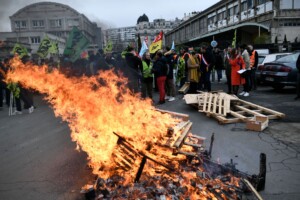French Workers Walk Out In Mass Strikes Against Plans To Raise The Retirement Age