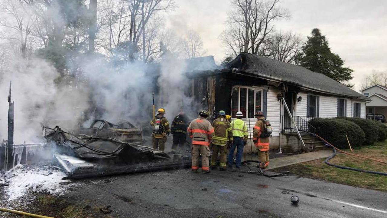 Officials: No one injured after garage fire spreads to home in ...