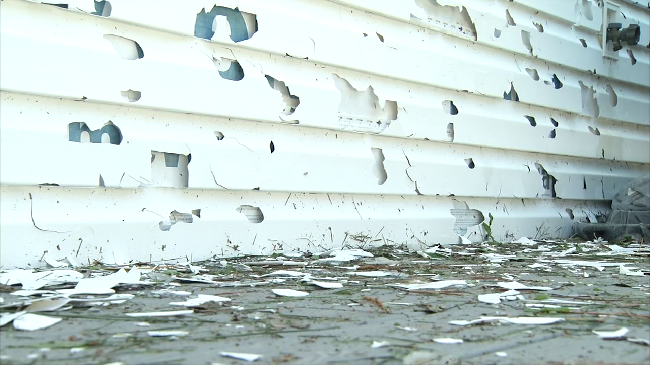 "There were 200 probably golf ball sized dents in both vehicles