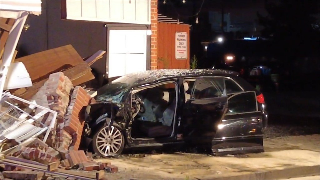 Car Crashes Into Mad Hatter