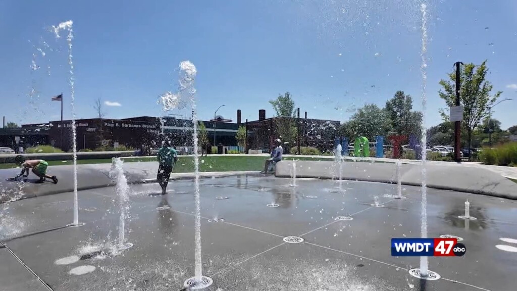 Locals Enjoy The Sun In Unity Square