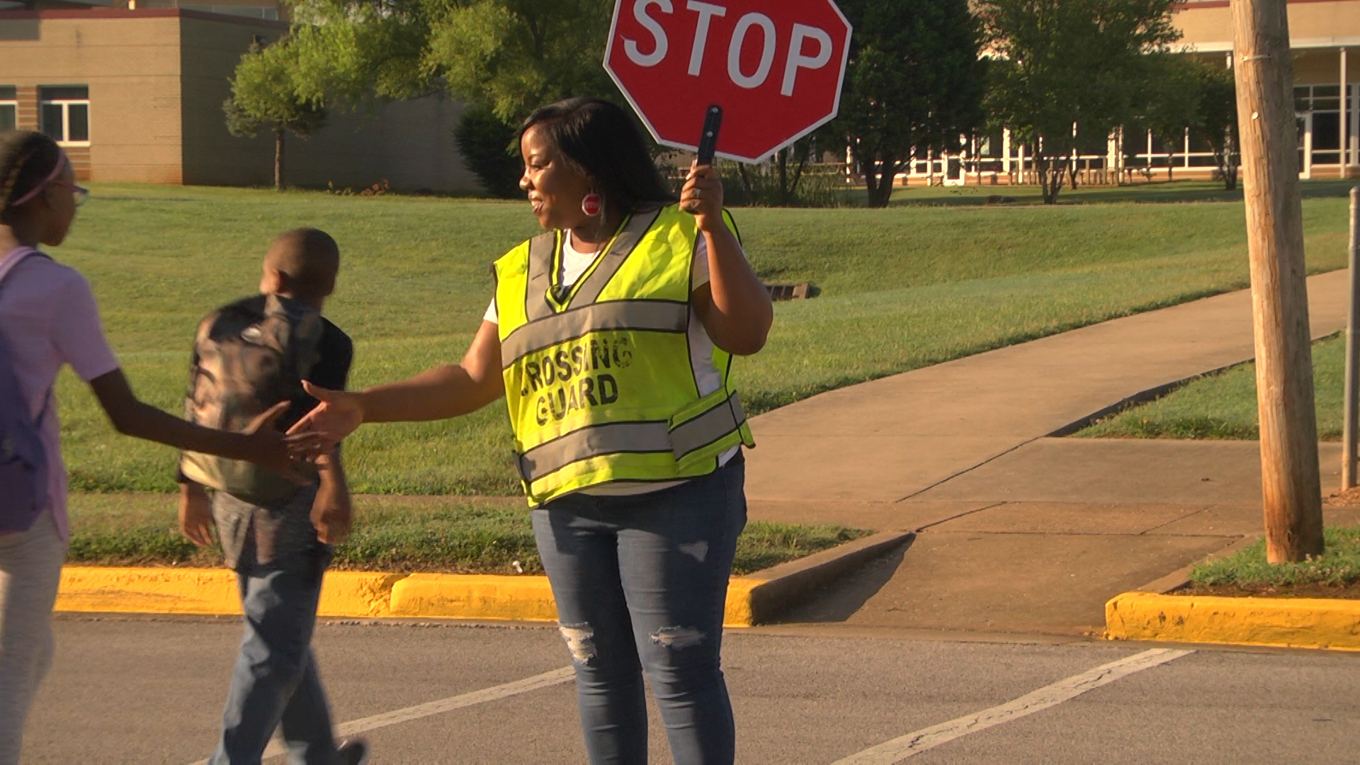 crossing-guard-continues-mother-s-legacy-of-love-for-school-children