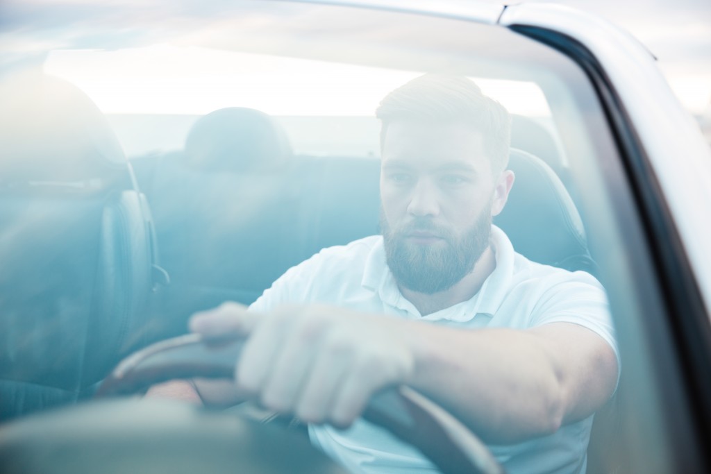 Handsome Bearded Man Driving Car