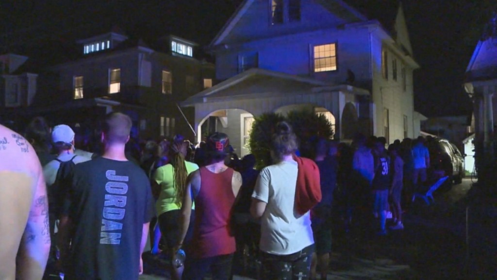 Angry Crowd Surrounds House In Search For Missing Teen