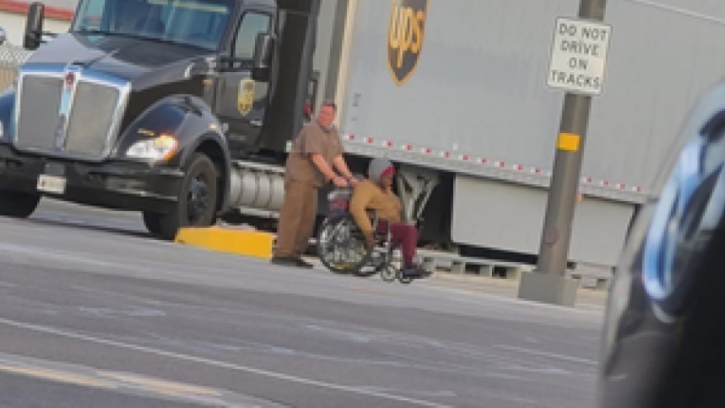 Stuck On The Tracks: Truck Driver Pulls Woman From Path Of Train