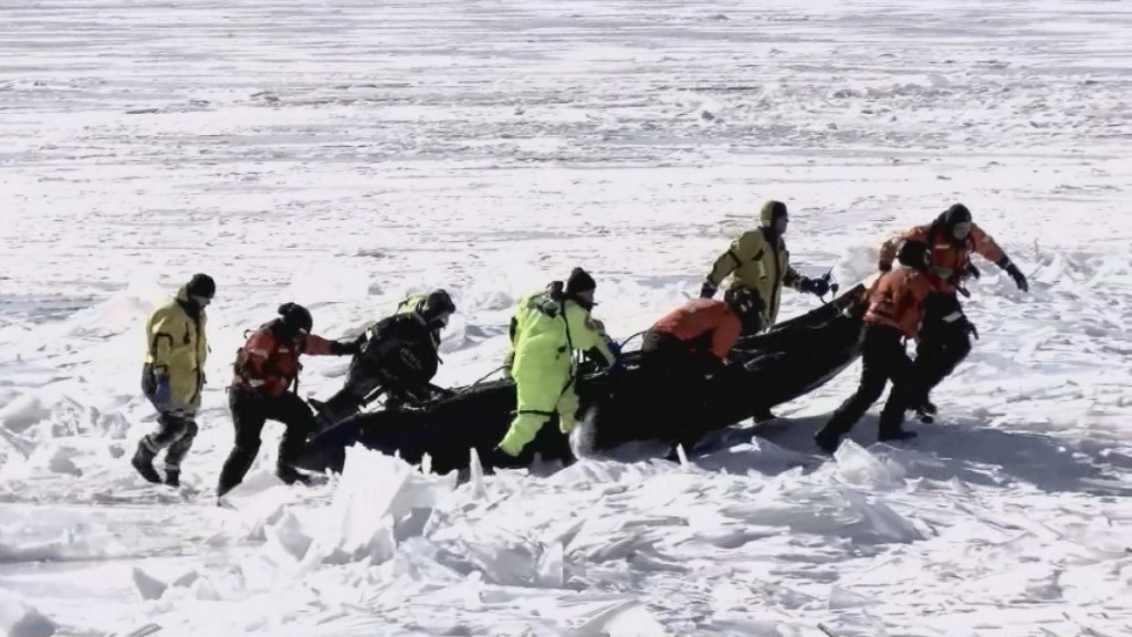 Cracking Ice Strands Minnesota Ice Fishermen