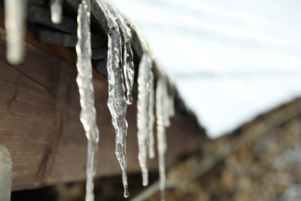 Icicle Hanging From The Roof, Close Up And Selective Focus