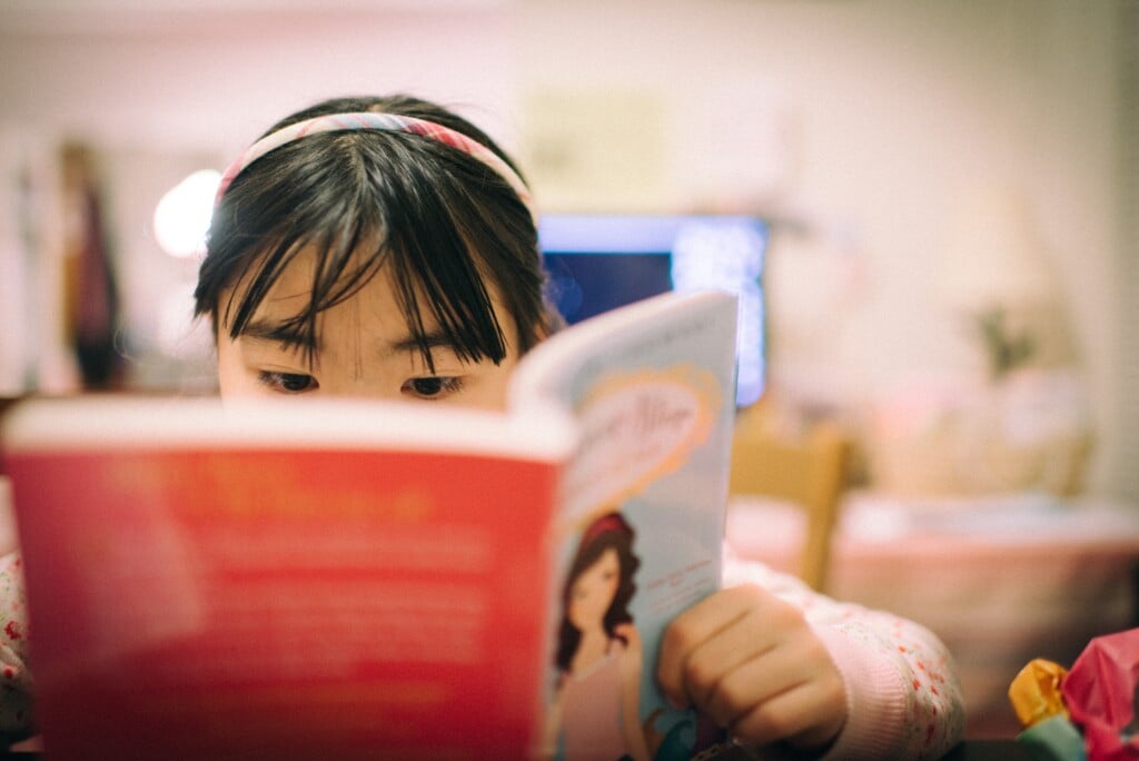 Focused Child Reading Book Indoors At Home 2026 09 23 04 52 15 Utc