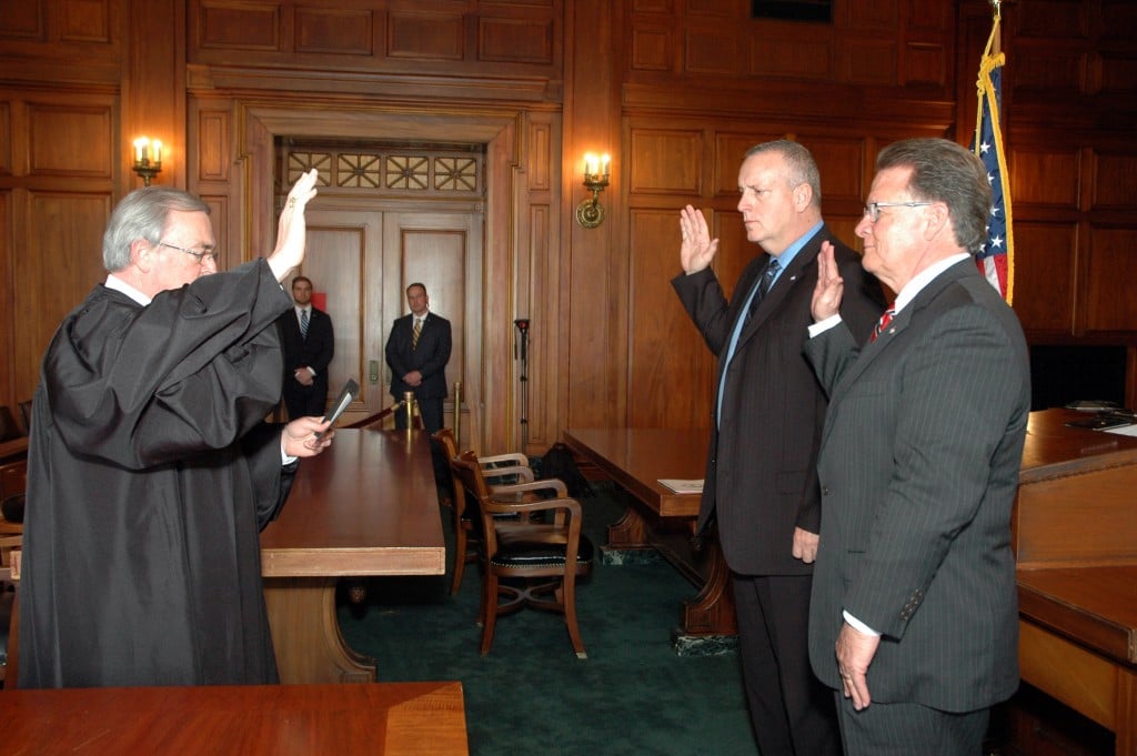 KY Supreme Court Chief Justice John Minton Jr. swears-in new KSP Commissioner Richard Sanders (right) and Deputy Commish William Payne (center-right) in Capitol 3-30-16
