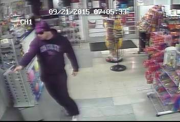Security camera video of Clell Swinney of Mt. Vernon accused of robbing Midway Express in Berea on 9-21-15.  Danielle Young also charged with robbery in the case.