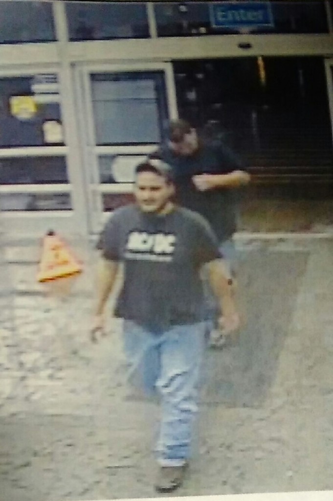Security camera images of two men believed to have stolen iPhone 6 from Walmart near Corbin on 1-10-16