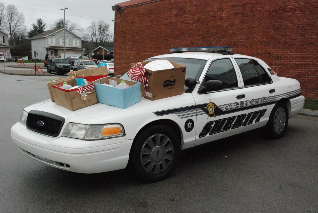 Criminal Justice classes in Corbin donate food to law enforcement to help feed the less fortunate for the holidays