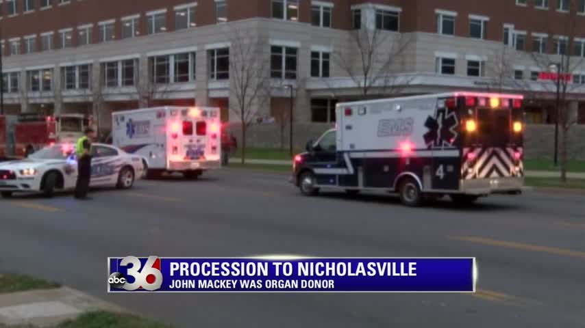 Motorcade of ambulances and emergency vehicles takes body of fallen Jessamine County Paramedic John Mackey home to Nicholasville from UK Hospital 11-9-15