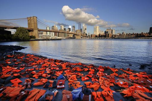 Advocates with Oxfam America have placed hundreds of life jackets on the ground along the New York City waterfront to draw attention to the refugee crisis