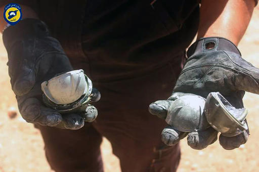 In this photo provided by the Syrian Civil Defense group known as the White Helmets