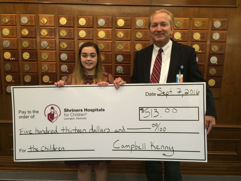 Campbell Kenny presents fundraising check to Shriner's Hospital in Lexington 9-7-16