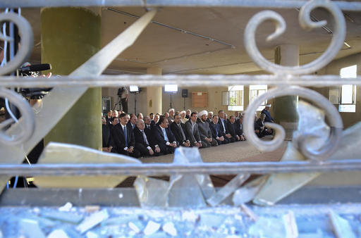 In this photo released on the official Facebook page of the Syrian Presidency