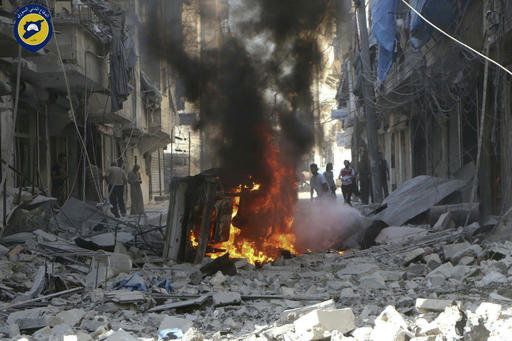 In this photo provided by the Syrian Civil Defense group known as the White Helmets