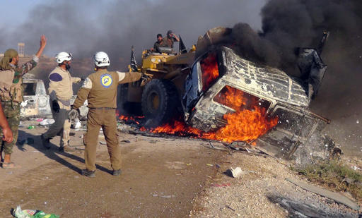 This photo provided by the Syria Press Center (SPC)