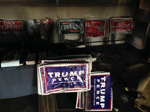 Melted campaign signs are seen at the Orange County Republican Headquarters in Hillsborough