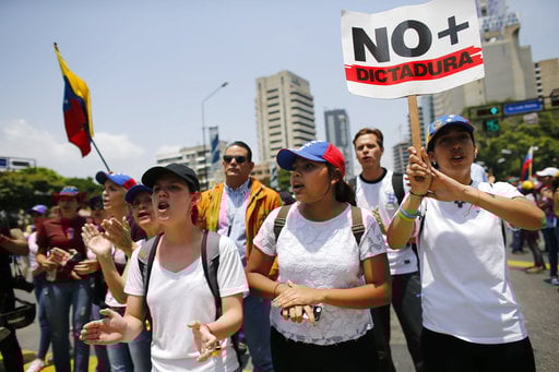 A man shouts anti-government slogans during a protest in Caracas