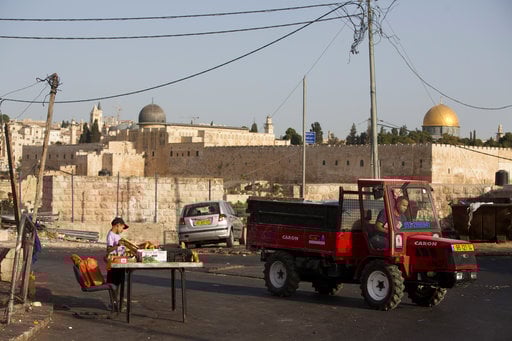 A Palestinian youth sells bagels outside Jerusalem's Old City