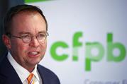 Mick Mulvaney speaks during a news conference after his first day as acting director of the Consumer Financial Protection Bureau in Washington