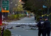 Bicycles and debris lie on a bike path after a motorist drove onto the path near the World Trade Center memorial