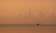 The San Francisco skyline is obscured by smoke and haze from wildfires Thursday