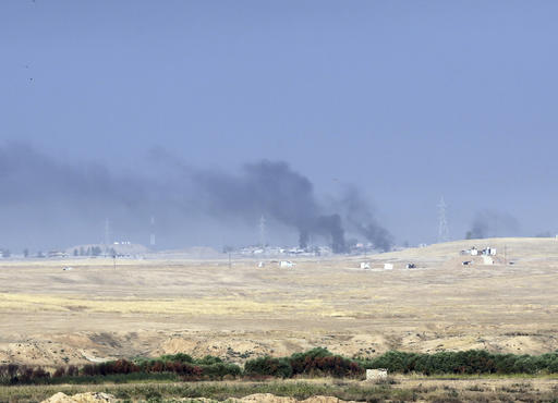 Smoke rises from Islamic state positions after an airstrike by coalition forces in Mosul