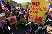 Muslim and civil rights groups and their supporters gather at a rally against what they call a  "Muslim ban" in Washington