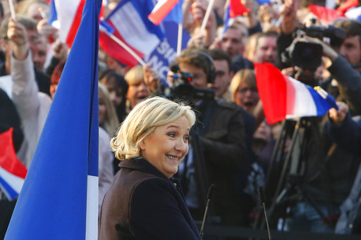 French far-right leader and presidential candidate Marine Le Pen addresses people in Ennemain