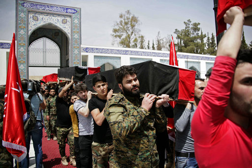 In this photo released by the Syrian official news agency SANA