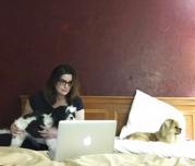 Associated Press correspondent Tamara Lush poses for a photo with her dogs