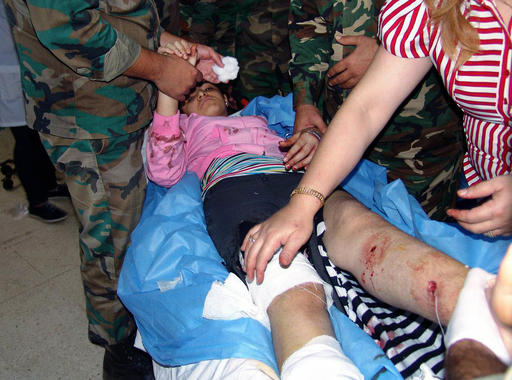 In this photo released by the Syrian official news agency SANA