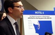 Washington state Attorney General Bob Ferguson addresses a news conference Wednesday