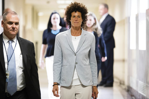 Andrea Constand walks to the courtroom during Bill Cosby's sexual assault trial at the Montgomery County Courthouse in Norristown
