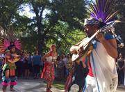 An Aztec dancer participates in a ceremony on Monday