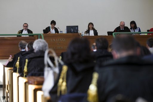 Judges attend a corruption trial in Rome