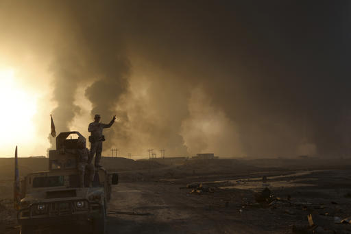Smoke rises from Islamic state positions after an airstrike by coalition forces in Mosul
