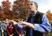Democratic gubernatorial candidate Lt. Gov. Ralph Northam talks with volunteers at a canvass kickoff site in Sterling