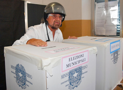 Five-Star Movement's leader Beppe Grillo casts his ballot for Italy's mayoral elections in Genoa