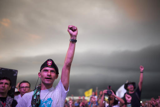 Rebels cheer during the closing event of the 10th conference held by the Revolutionary Armed Forces of Colombia