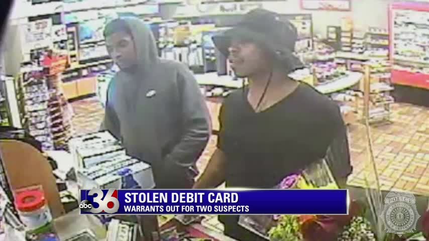 Kwanty Christian and Carlos Lamar on security camera video in gas station using stolen debit card from armed robbery