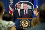 Attorney General Jeff Sessions accompanied by Deputy Attorney General Rod Rosenstein