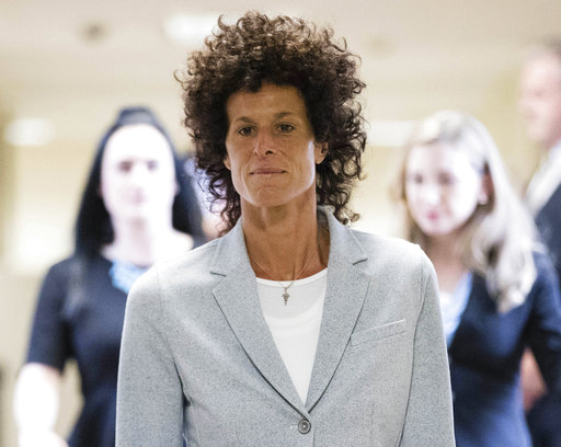 Andrea Constand walks to the courtroom during Bill Cosby's sexual assault trial at the Montgomery County Courthouse in Norristown