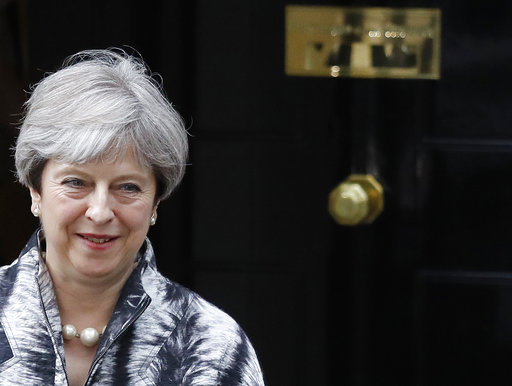 Britain's Prime Minister Theresa May leaves after a cabinet meeting at 10 Downing Street after the general election in London